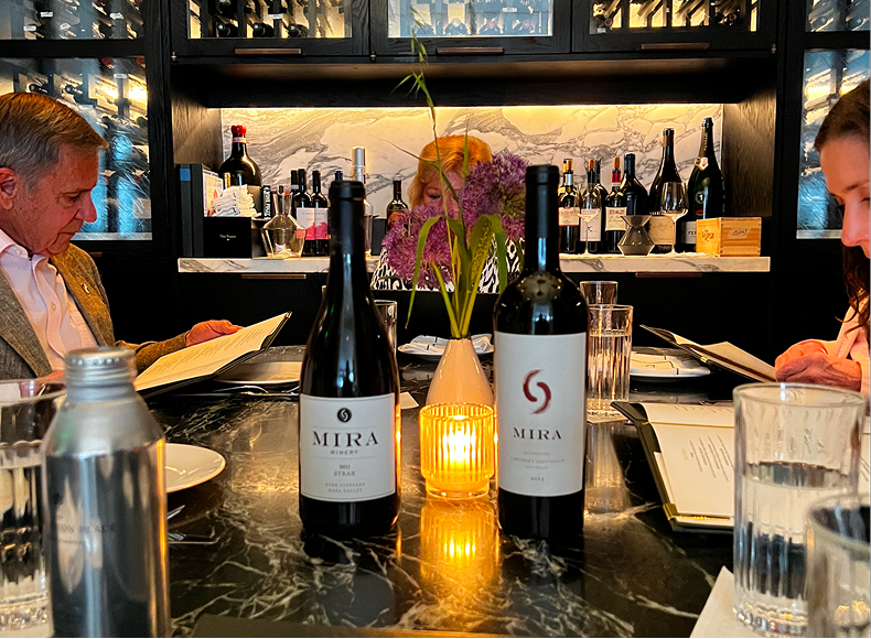 Bottles of Mira 2014 Syrah and 2013 Pinot Noir